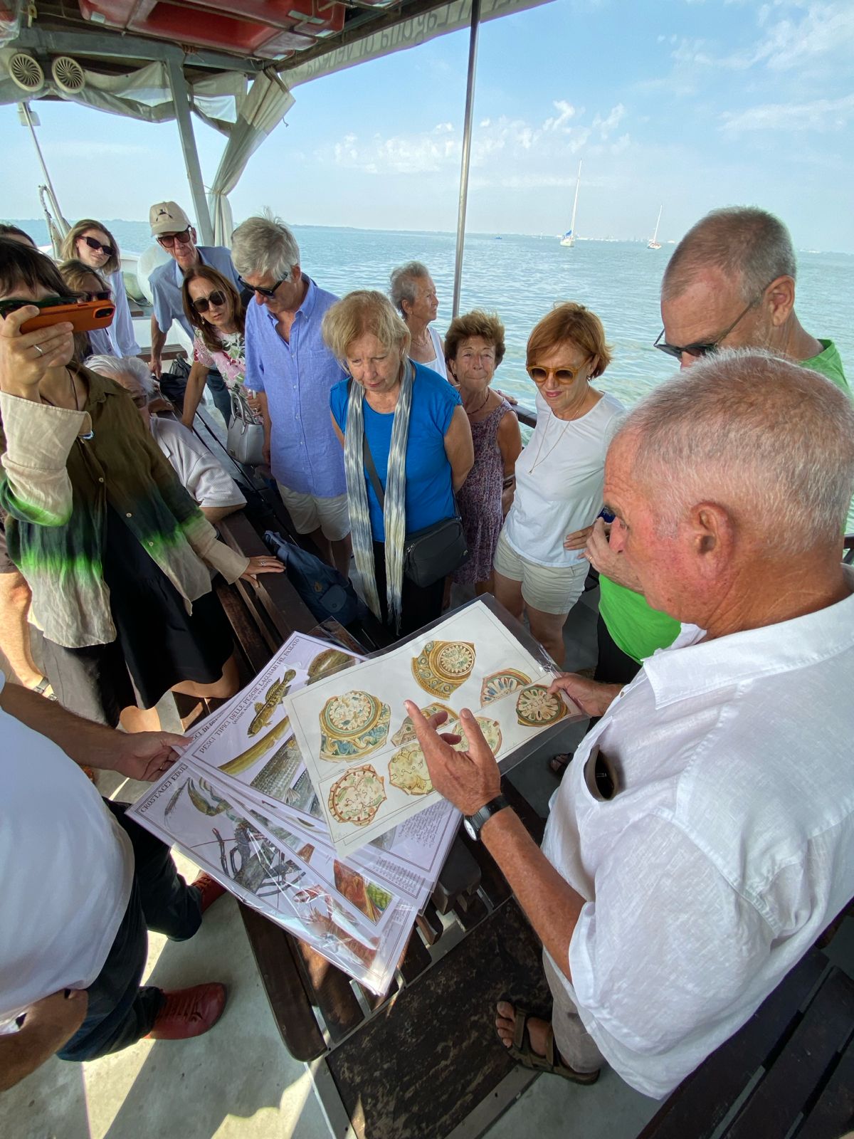 ▴ Blue Seniors Lagoon boat trip with artist Luigi Divari, Venice 2024 © Michele Tagliavini.